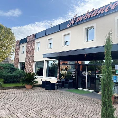 Ambiance Hotel Limas Bagian luar foto